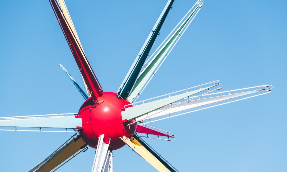 Photo of a red and white postmodern windmill