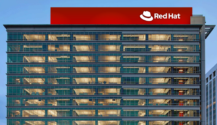 Photograph of the north side of Red Hat Tower in downtown Raleigh, NC, featuring the Red Hat logo version A
