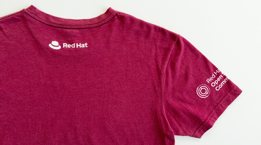 T-shirt with both the Red Hat logo and the Red Hat Open Studio Community initiative logo.