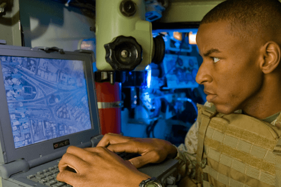 Soldier using technology in the field