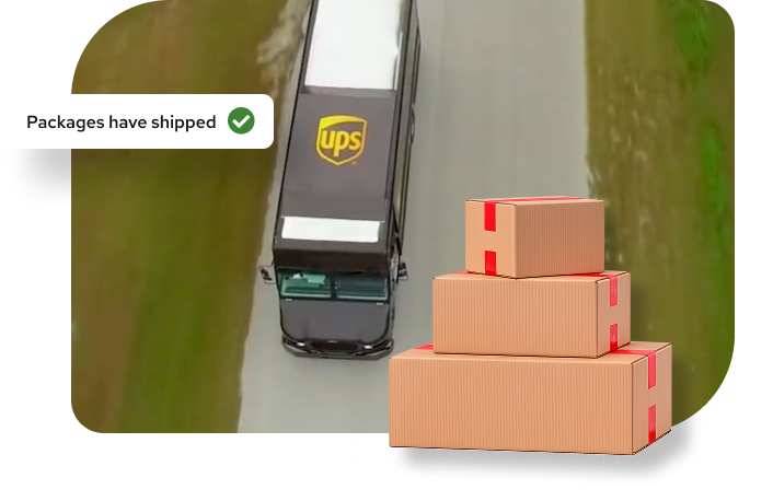 A UPS truck on a road with stacked packages and a 