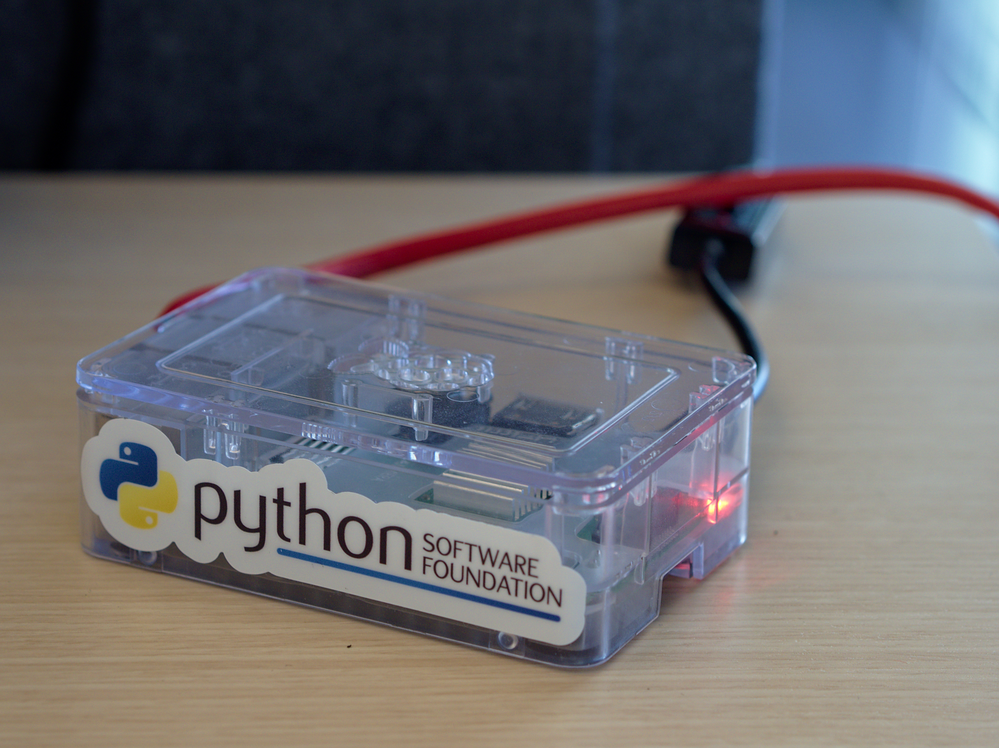 A raspberry pi case plugged into the network