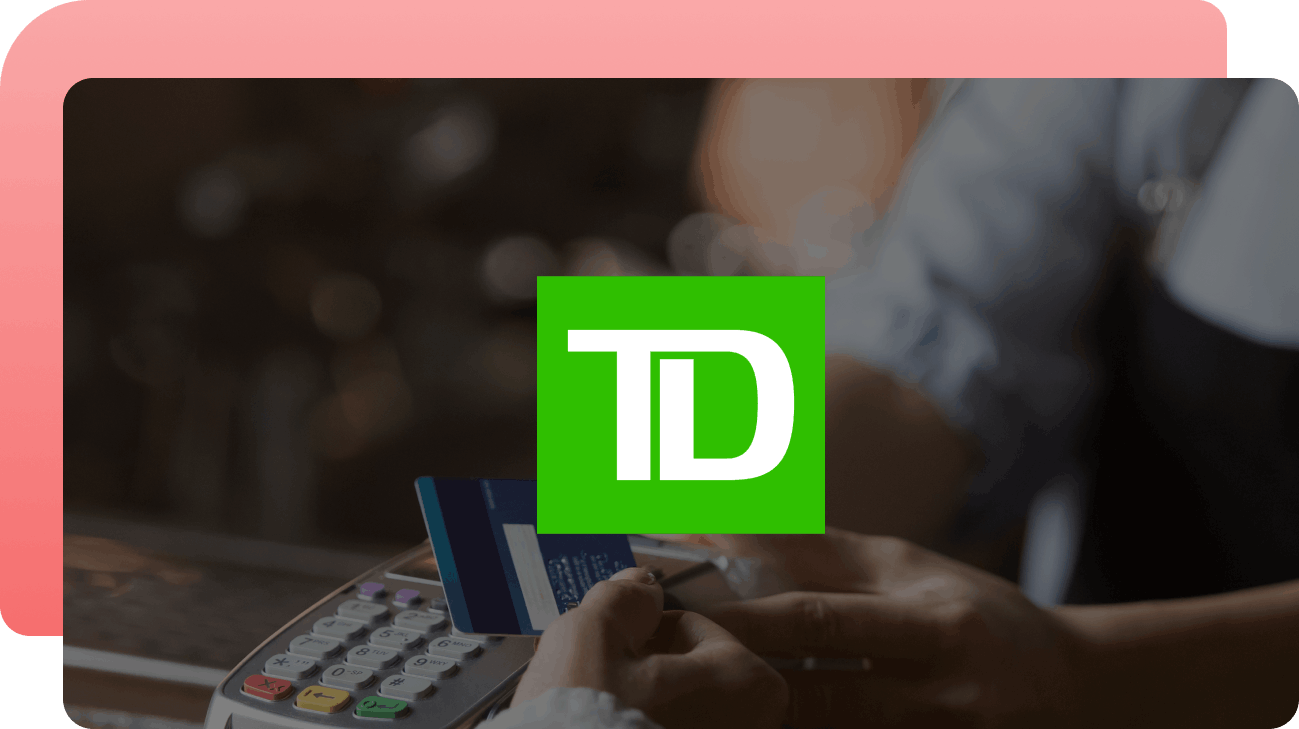 TD logo over a photo of a person paying with a credit card