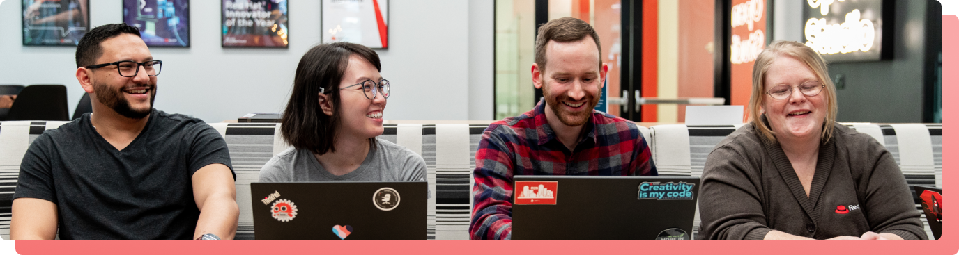 Group of colleagues smiling and working together
