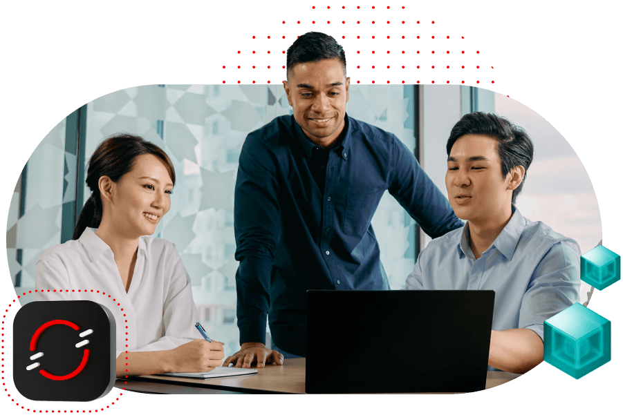 Three colleagues collaborating around a laptop in a an office setting