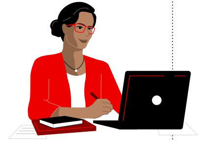 Women wearing red glasses and a red shirt working on a laptop