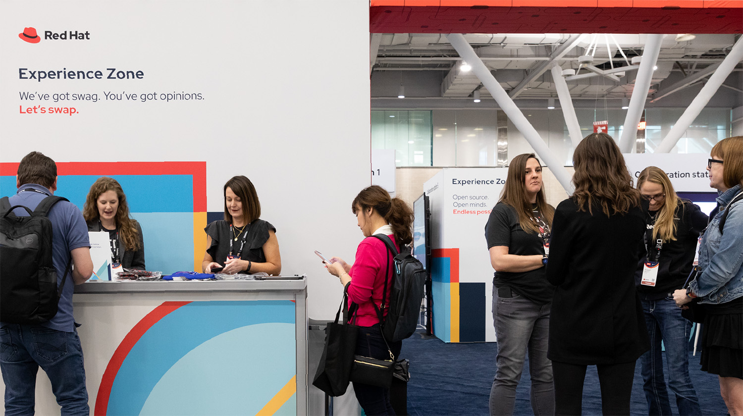 Red Hat-branded event booth.