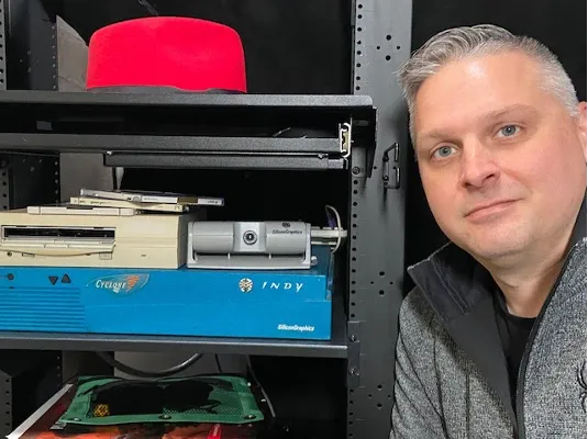 The author and a $26,000 Silicon Graphics Indy workstation