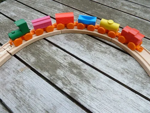A photograph of a wooden toy train.
