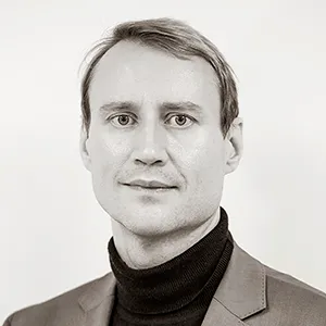 Black and white profile photo of Lenni Laukkanen