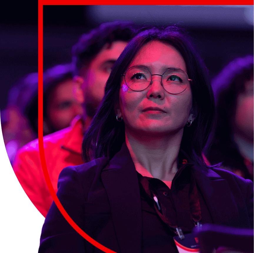 woman sitting in audience at Red Hat Summit