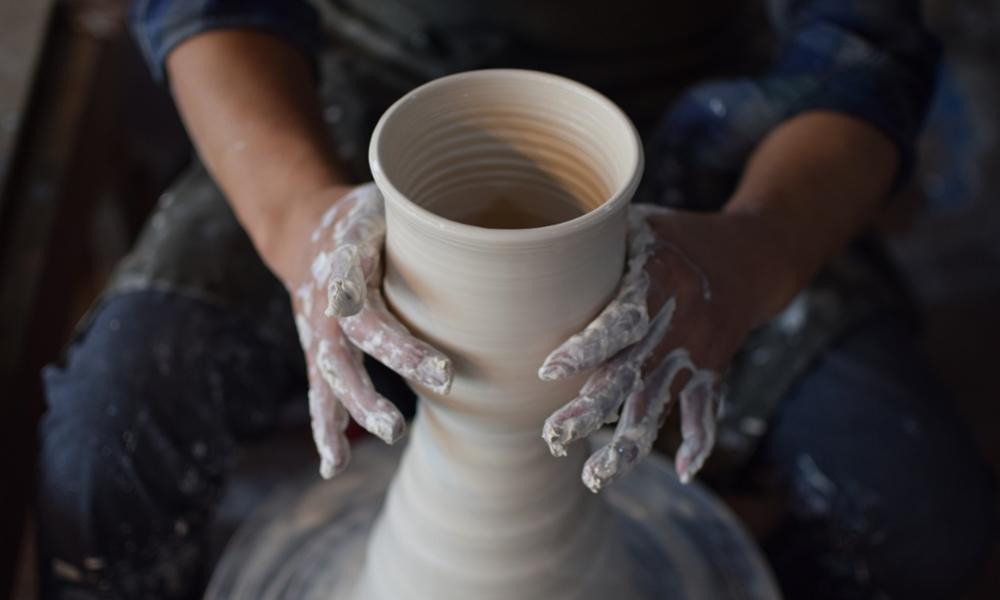 Creating pottery with hands